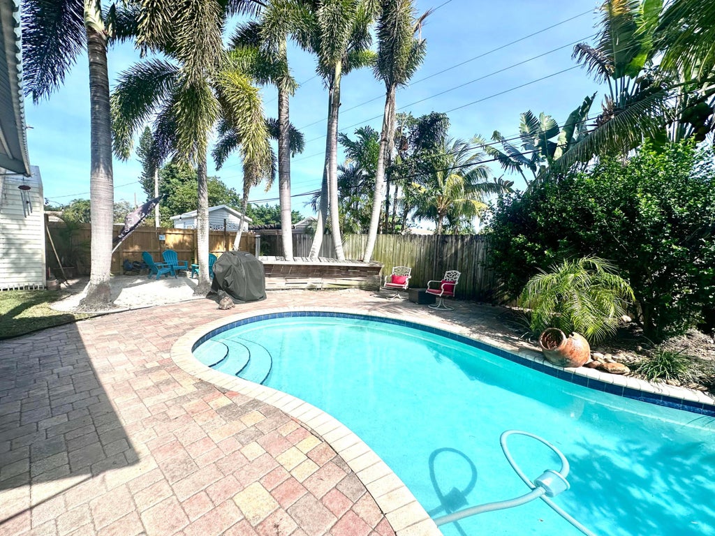 Photo of 1400 NW 46th Street, Fort Lauderdale, FL 33309 (MLS # B26033008)