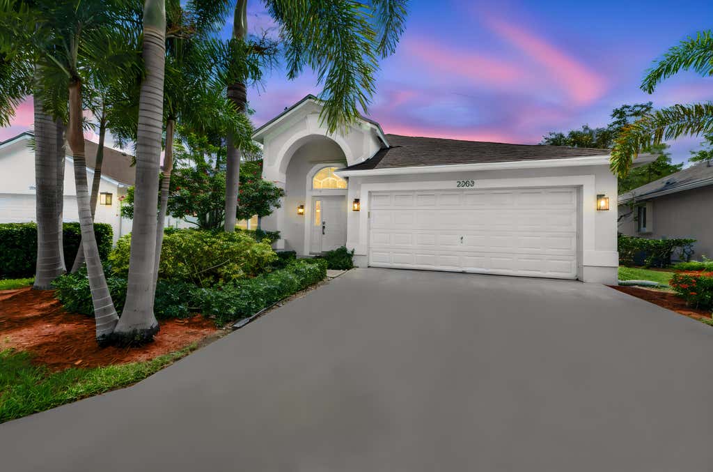 Photo of 2203 Soundings Court, Greenacres, FL 33413 (MLS # B26063916)