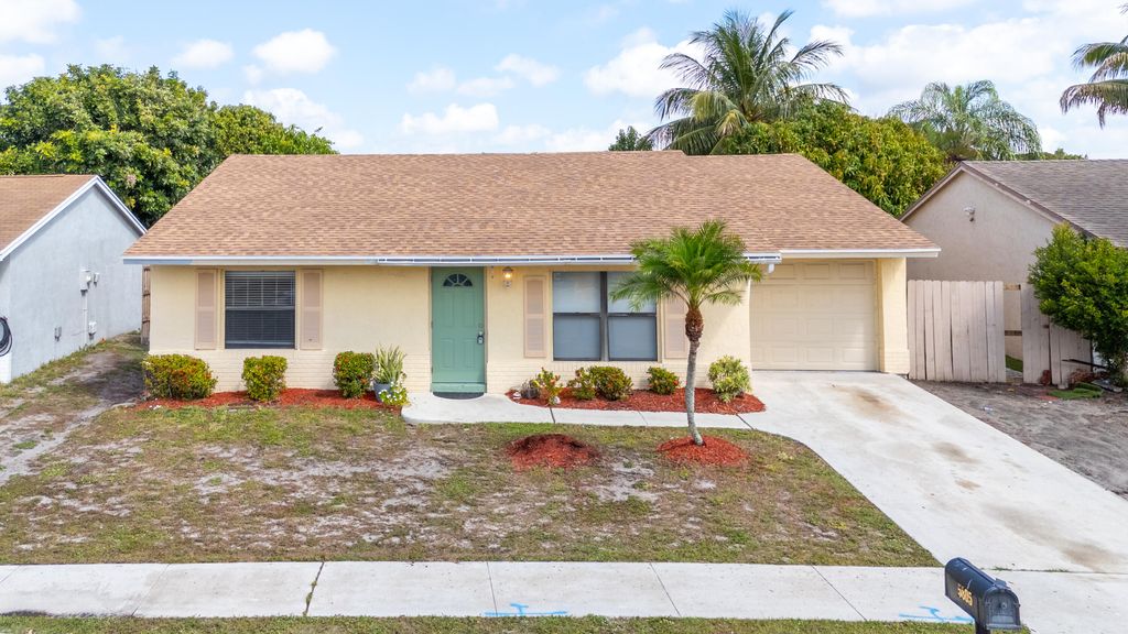 Photo of 5805 Ithaca Circle E, Lake Worth, FL 33463 (MLS # R11077580)