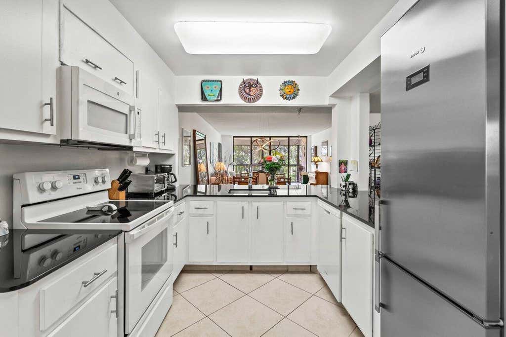 Photo of 6320 BOCA DEL MAR Drive #302, Boca Raton, FL 33433 (MLS # B26059593)