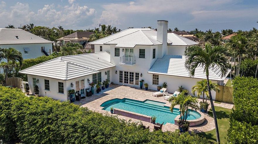 Lovely home built in 2015 situated on a private lot with a high elevation on coveted Ocean Terrace in the North End of Palm Beach, just a few homes from the Ocean. Open floor plan with a large living room and family room with French doors leading out to the pool and summer kitchen. Custom state of the art kitchen, marble baths and an elevator to the 2nd floor that offers a spacious master suite, his and her baths & large closets, as well as an additional ensuite bedroom or office. Wood floors throughout, custom lighting, 2 car garage with a large driveway, and a gorgeous pool area. All hurricane impact windows & doors. Ocean Terrace has a deeded wide beach for Ocean Terrace homeowners with a newer cabana offering rest rooms, kitchen and barbeque, a plus to an already wonderful home.