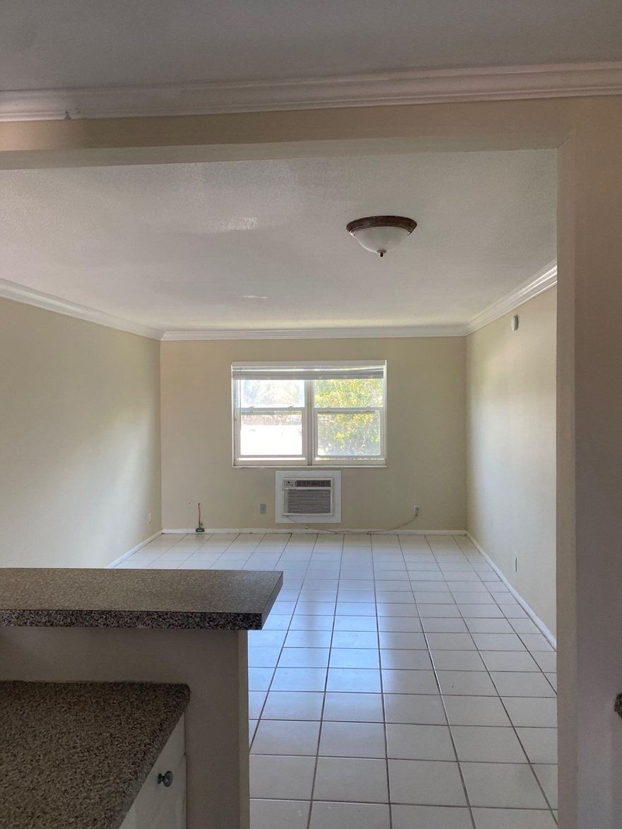 Great location! East Sample close to Lighthouse Point and Deerfield Beach! Open kitchen that has been remodeled. Great finishes. Spacious with lots of closet space. Laundry facilities on site.  Low HOA fees make this attractive to all buyers. Call for a tour today