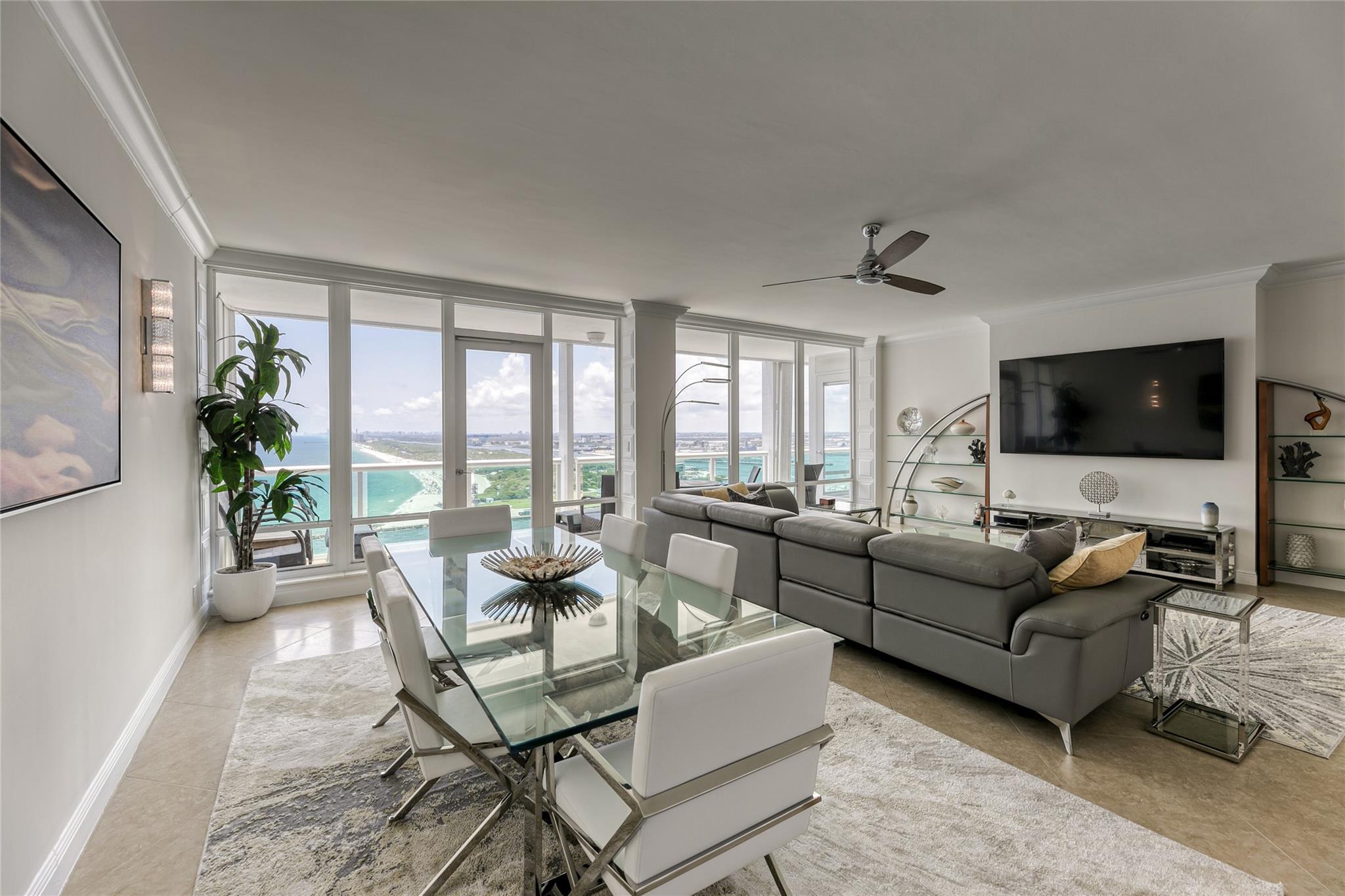 PENTHOUSE 6 Mo. rental (on or off season)w/10-Foot Ceilings & Breathtaking Ocean, Inlet & Coastal Views Stretching to Miami! This exceptional residence is offered fully furnished w/three 80" tvs & designer-curated interiors. Expansive, open kitchen & custom built-in bar featuring wine cooler, refrigerator & quartz counter. Large bdrms offer panoramic ocean views & fitted closets for ample storage. Floor-to-ceiling windows thru-out flood the space w/natural light framing the spectacular vistas. Located on 10 acres of beachfront property w/ 5-star amenities, including Multiple fitness rms, Grand lobby, On-site restaurant, Guest suites, EV charging stations, 2 resort-style pools & Beach service on widest stretch of beach. 6 months rent Paid in advance w/Proof of funds. NO pets