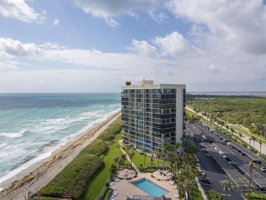 Welcome to Paradise... This 1 Bedroom 2 Bath Penthouse Unit offers views of the Ocean from both the Living Room and Master Bedroom. Golf and River views from Breakfast Nook/Office. This 24hr manned Gated Community features Game Room, Fitness Center with Sauna, 2 Pools, Tennis Courts & Golf with Membership included and don't forget to bring your boat... a Marina too! This truly is Florida Living... Welcome to the Good Life!