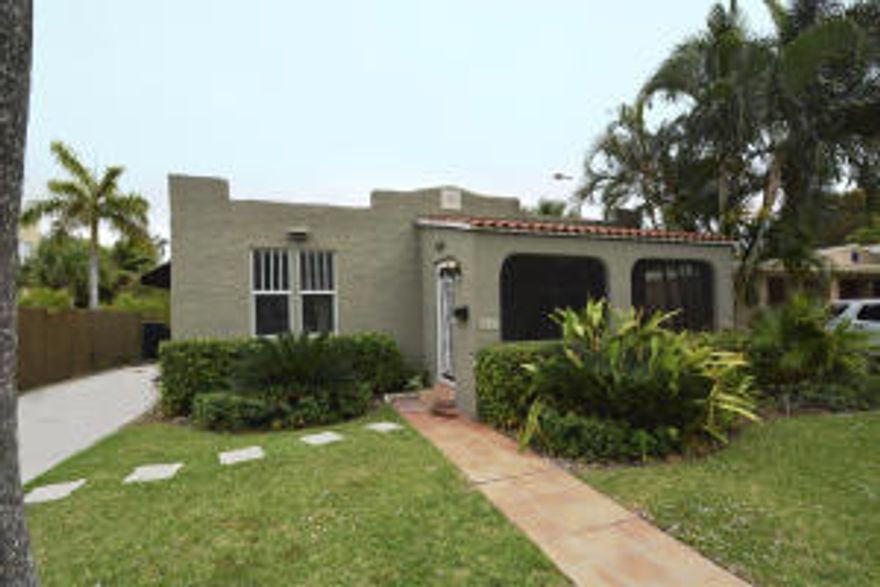 This delightful Mission Style home is conveniently located in Historic Flamingo Park and is just about as cute as it can get.   Offering 2 bedrooms and 2 baths and a beautiful new kitchen with granite counter tops and stainless steel appliances.  The home was renovated recently including new impact windows, new roof, etc.  The private back yard is surrounded by lush landscaping and hosts a large sparkling new pool with a Chicago Brick patio.  The screened front porch is perfect for an afternoon snooze.