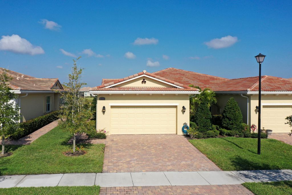Photo of 24060 SW Firenze Way, Port Saint Lucie, FL 34986 (MLS # B26001867)