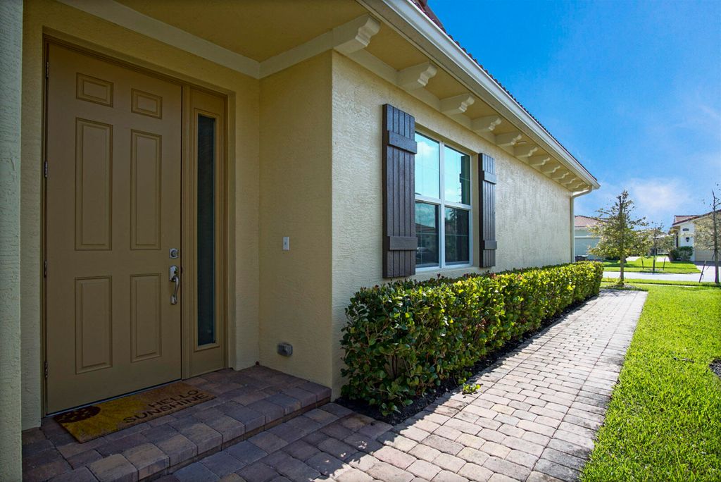 Photo of 24060 SW Firenze Way, Port Saint Lucie, FL 34986 (MLS # B26001867)