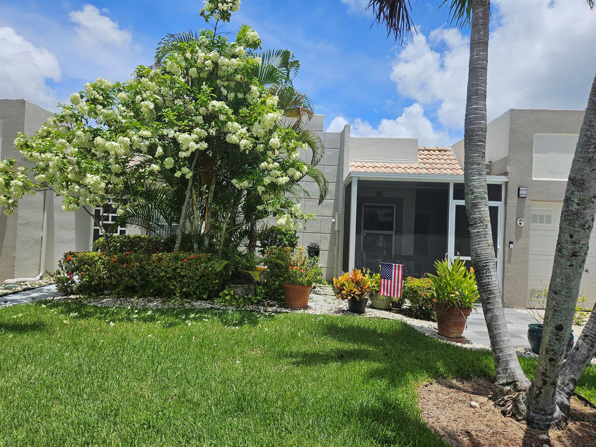 REDUCED! Hard to find!! Beautiful Updated Villa w/1 car garage! One resident must be 55+. Enjoy the lovely waterfront view, relaxing on your large covered back patio. Villa also has a comfortable covered front patio!! Walk into a spectacular view of the lake & nature from the front door! Open kitchen, living rm & dining room with hurricane windows through-out. Kitchen completely renovated. Gorgeous granite, white cabinets, black stainless appliances .Tiled thru-out.