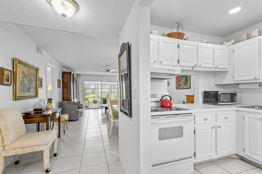 Photo of 144 LAKE CAROL Drive, West Palm Beach, FL 33411 (MLS # B26066410)