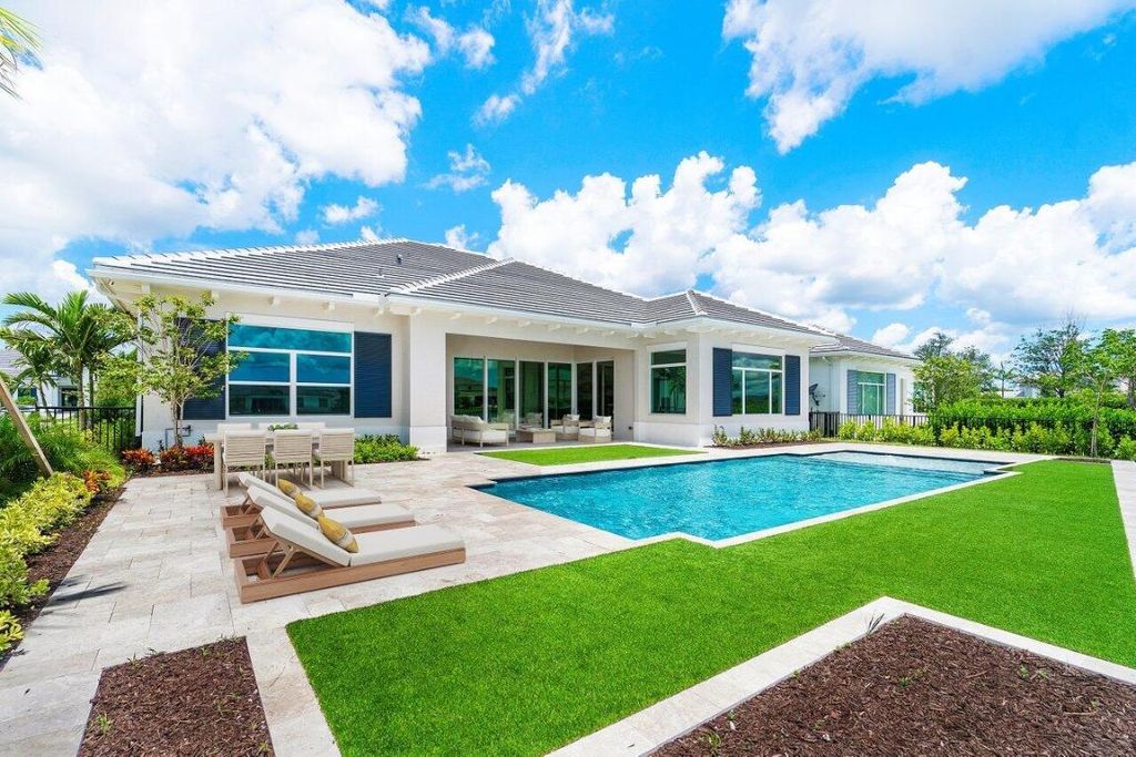 Photo of 9105 Coral Isles Circle, Palm Beach Gardens, FL 33412 (MLS # R11001971)