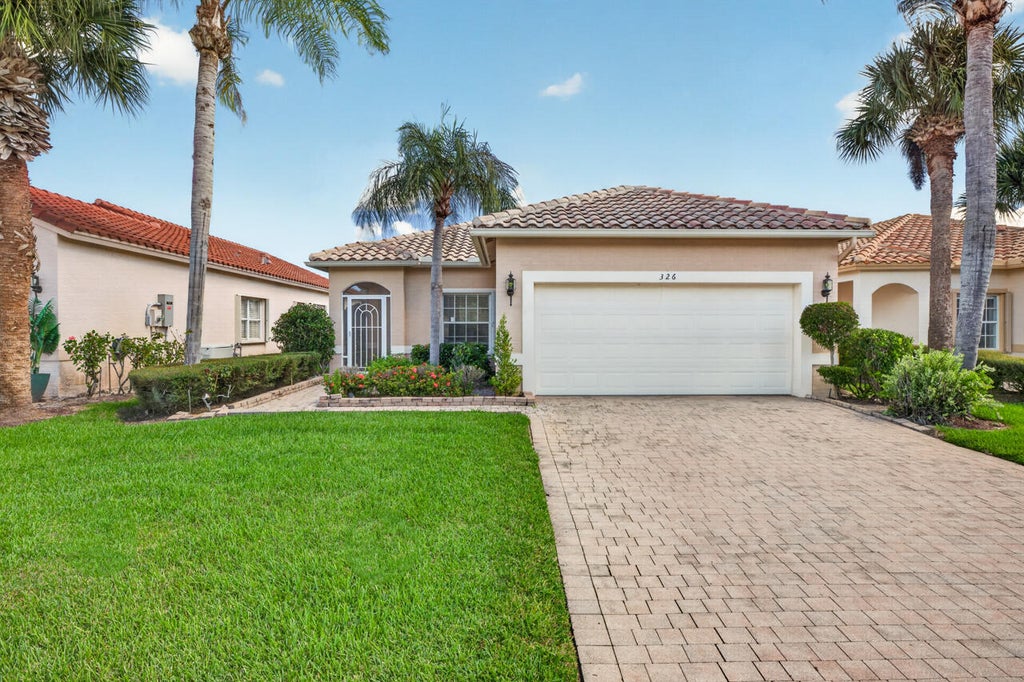 Photo of 326 NW TREELINE Trace, Port Saint Lucie, FL 34986 (MLS # B26091518)