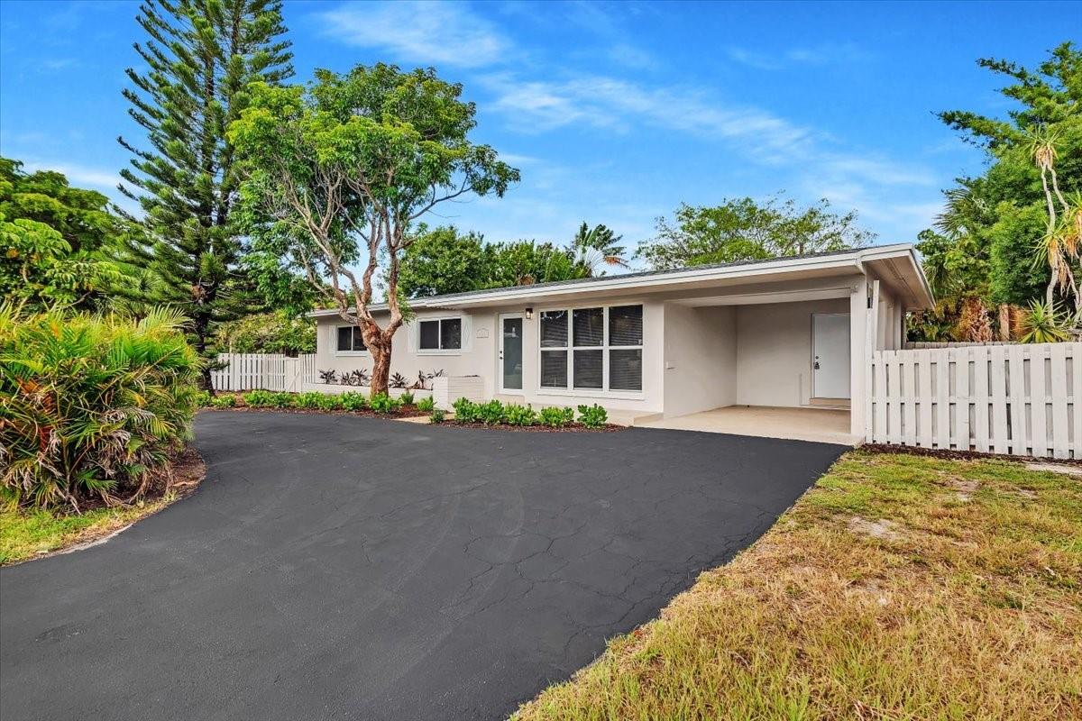 Welcome to this beautifully upgraded home in a highly sought-after east neighborhood! This stunning property has been thoroughly upgraded with a NEW ROOF, IMPACT WINDOWS & DOORS, & modern finishes & features throughout. Enjoy the spacious layout, updated kitchen with modern European cabinets, Callacatta countertops and backsplash, brand new SS appliances, & luxurious organic modern bathrooms. The backyard is perfect for entertaining or relaxing with a great shaded cover deck, your own amazing pool and plenty of room for extra outdoor entertainment/living. Don't miss this opportunity to own a turnkey home in a fantastic location, only 2 miles from the beach and all restaurants/nightlife of Lauderdale-by-the-Sea, close to highways, Federal HWY and all east living has to offer!