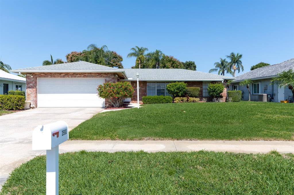 Photo of 2593 W Carandis Road, West Palm Beach, FL 33406 (MLS # R10880853)