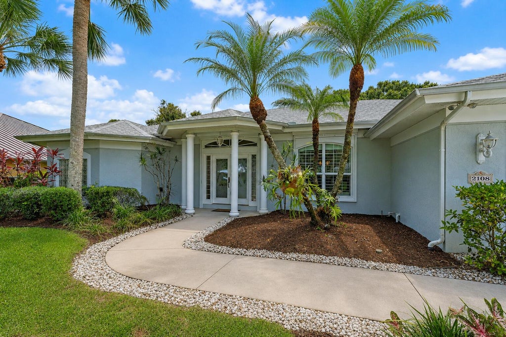 Photo of 2108 SW Oakwater Point, Palm City, FL 34990 (MLS # B26058559)