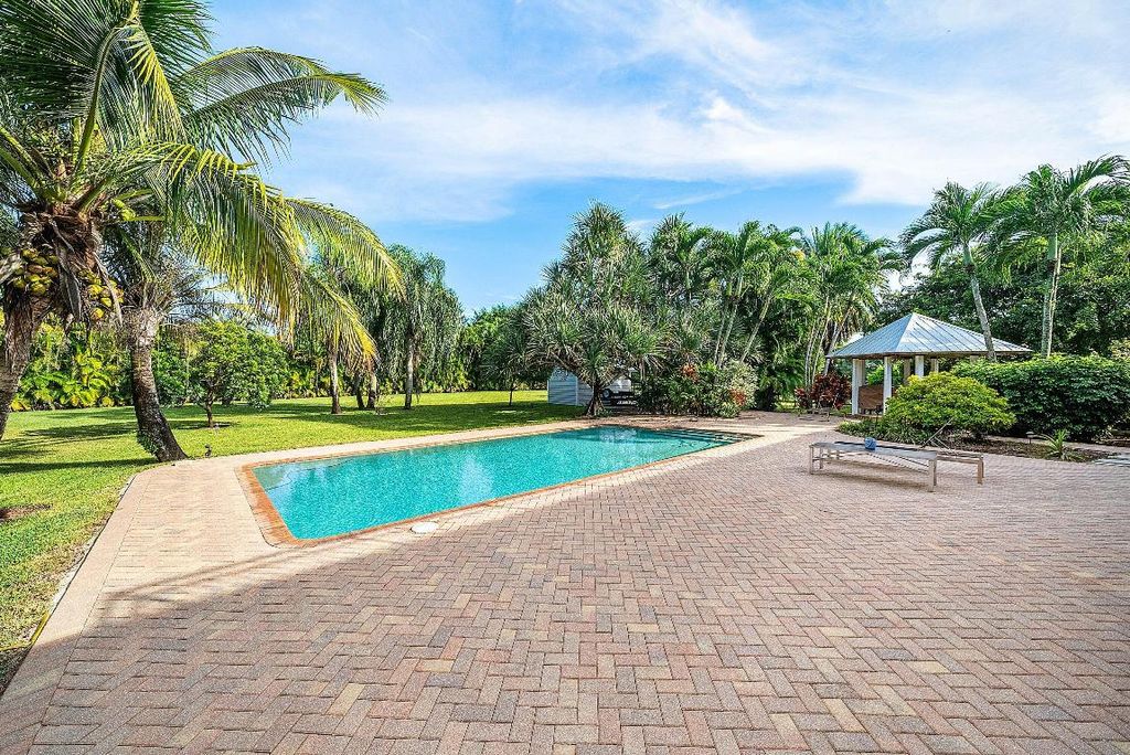 Photo of 8260 Native Dancer Road E, Palm Beach Gardens, FL 33418 (MLS # R11137544)