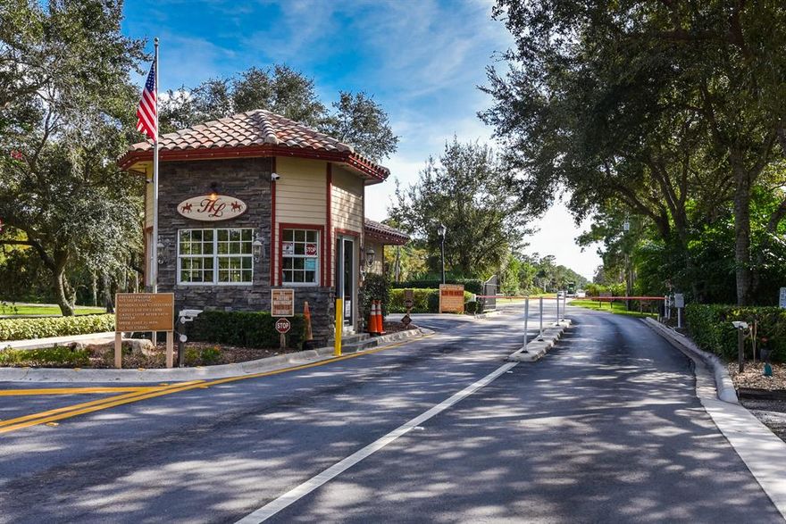 Build your own home, riding ring, barn with paddocks in the gated equestrian community of Homeland.  This partially cleared, 5-acre parcel is flat with no wetlands, tall native trees, adjacent to peaceful bridal paths, canals and abundant wildlife.  Live in your special paradise yet close to shops at the Wellington Mall and the world's premier winter event, The Wellington Winter Equestrian Festival.  Complete house plans also available.