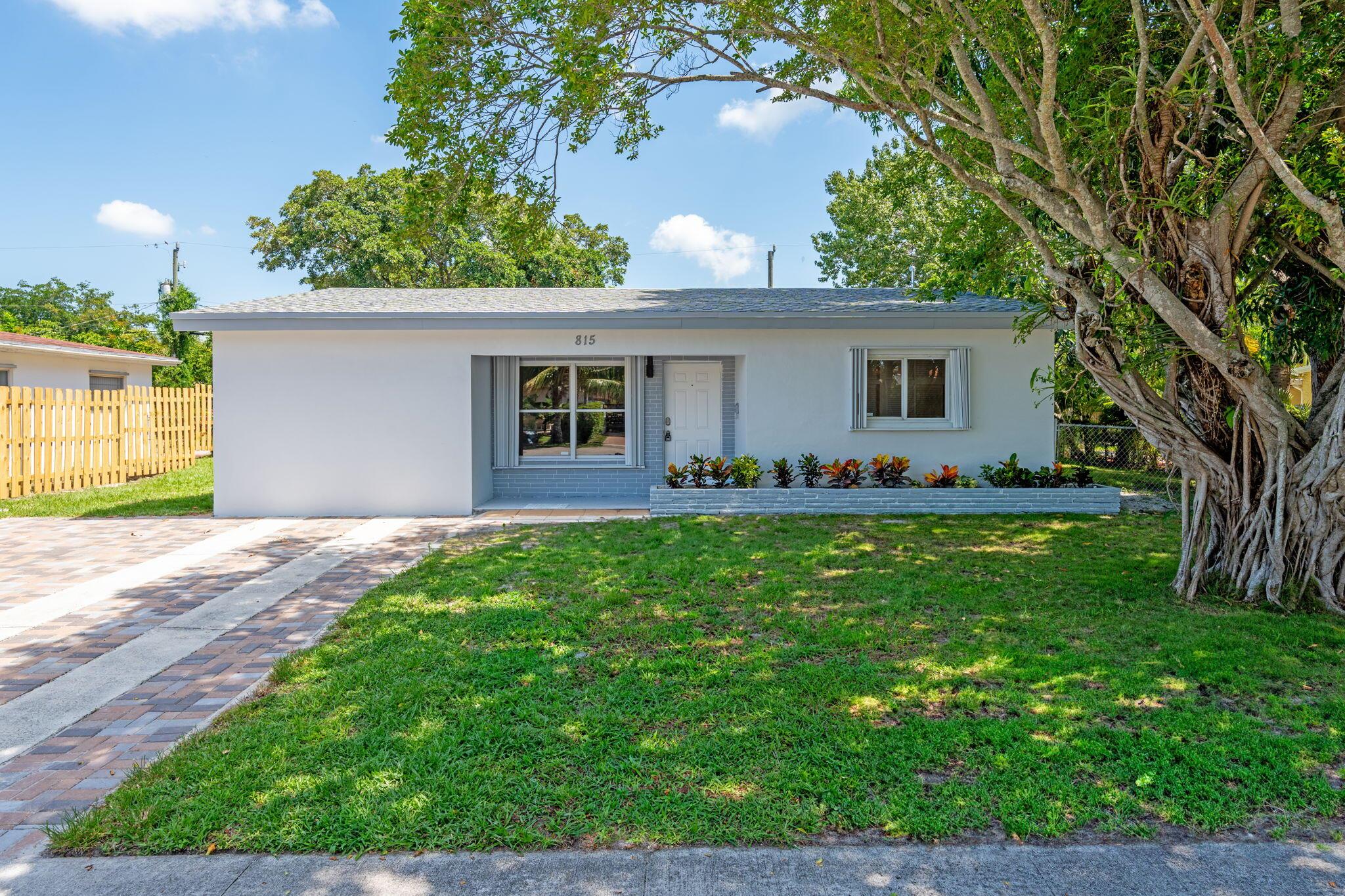 Beautifully updated 3-bedroom, 2-bathroom home in the heart of West Palm Beach! Featuring a brand new roof, new AC unit, updated plumbing and electrical, this property offers peace of mind and modern living. The layout allows for a flexible floor plan -- the third bedroom and bathroom can be easily converted into a private in-law suite or efficiency for rental income. Enjoy Florida living with a spacious patio, perfect for entertaining and enough space for a pool. Located just minutes from Downtown West Palm Beach, PBI Airport, I-95, and the beach. No HOA, great for homeowners or investors!
