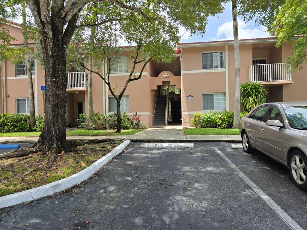Photo of 3231 Sabal Palm Manor #201, Hollywood, FL 33024 (MLS # F10519147)