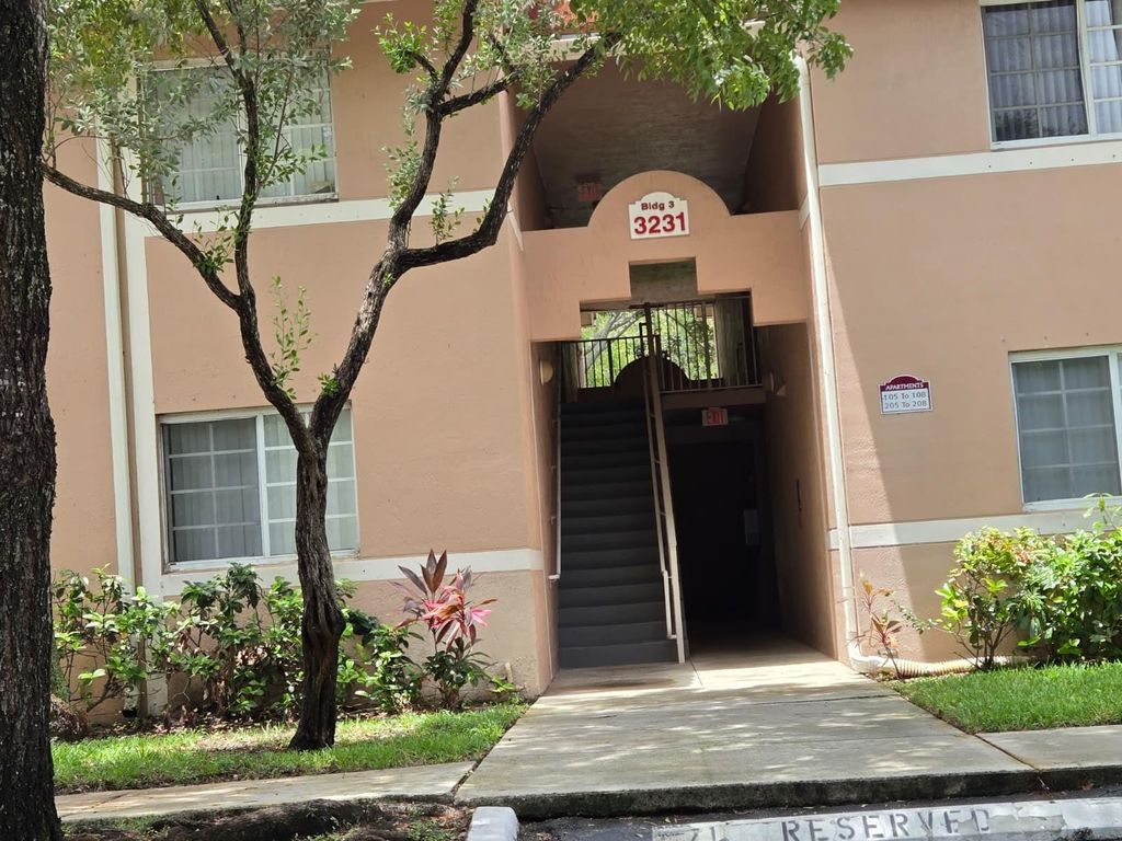 Photo of 3231 Sabal Palm Manor #201, Hollywood, FL 33024 (MLS # F10519147)