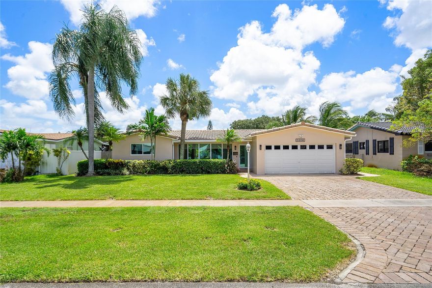 Upon entering you'll be greeted with a bright, L-shaped floor plan taking you through living room & dining room. A large kitchen is in the heart of the home with bar that opens to a grand FL room. Quartz counters & SS appliances. Stainless steel appliances. Ceramic tile floors, window blinds, and new LED high hat lighting throughout. Sparkling pool & gorgeous stone paved deck, beautiful landscaping, private fenced yard. NEW impact windows, master bath & water heater! Newer AC & electric panel. A rated ELM school. Central location puts you 2 min drive to I-95, TY City Park & ALL major shopping and restaurant plazas off the amazing Hollywood Hills! 15 min from the Beach. Rent includes pool maintenance. 3 Ring cams & ADT available for monitoring setup. Immaculate home!