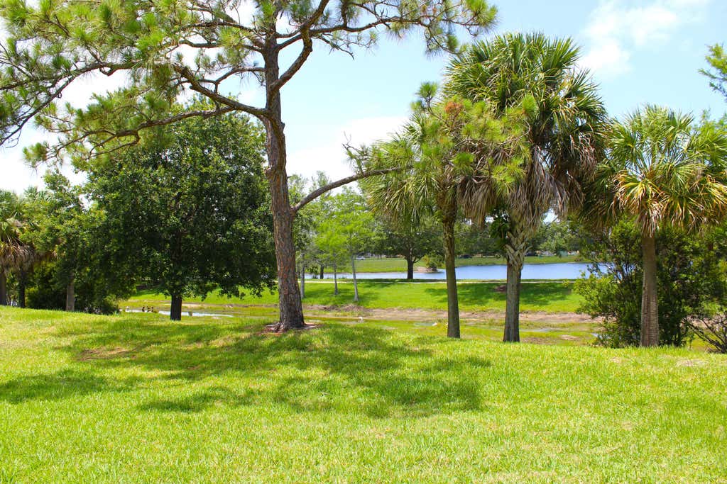 Photo of 1500 SE Royal Green Circle #102, Port Saint Lucie, FL 34952 (MLS # B26035341)