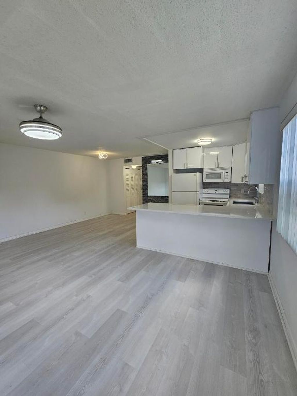 Photo of 105 Windsor E #105, West Palm Beach, FL 33417 (MLS # R11154189)