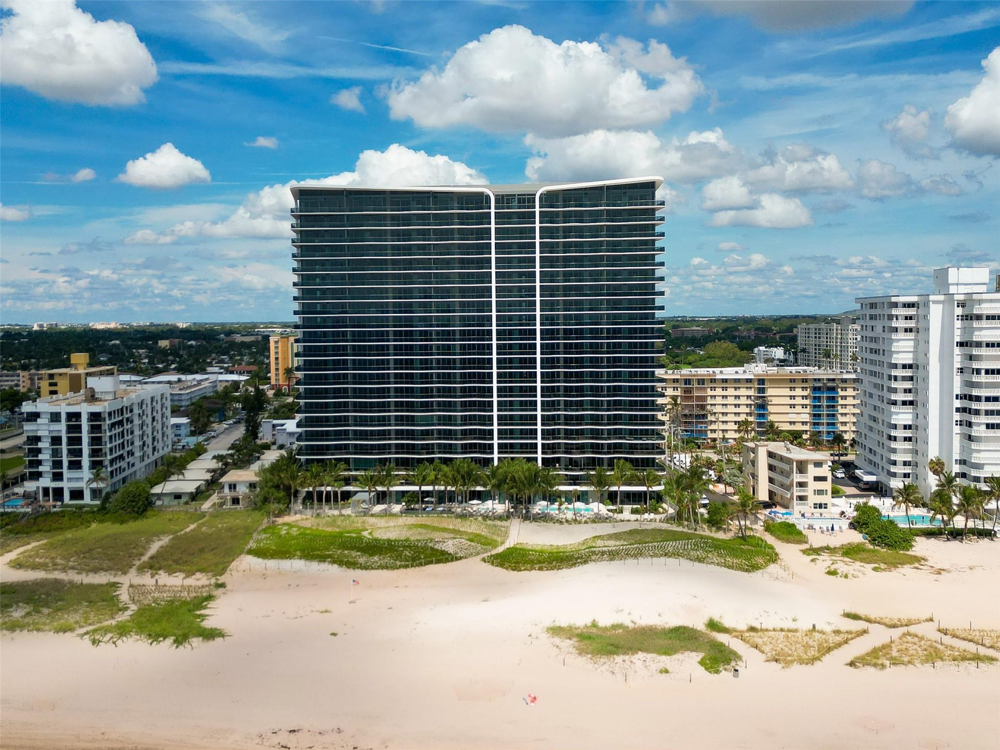 Modern, ultra-luxurious beachfront lifestyle everyone has been searching for. With multiple pools, oceanfront fitness & spa, pickleball, Cafe, Lounges & 5-star amenities, this is where elegance meets resort living. Future developments are years away & already pricing at $1,350+/ft—making this an incredible opportunity right now. Stunning floor-to-ceiling glass & designer finishes throughout. Enjoy over 280 feet of private beach with protected dunes making it your own oceanfront sanctuary. Walk to Pompano Beach Pier, Restaurants & Shops. Minutes to Las Olas Blvd, fine dining, world-class shopping, private & commercial airports. Whether you're seeking a full-time residence or a luxury escape, Casamar is unmatched in value, design & location. Flow-Through unit. 3bed, 3.5bath + Large open Den