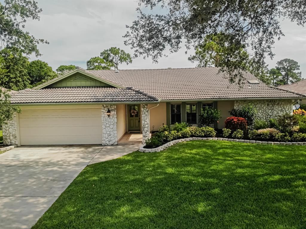 Photo of 1345 SW Cedar Cove Cv, Port Saint Lucie, FL 34986 (MLS # R10812007)