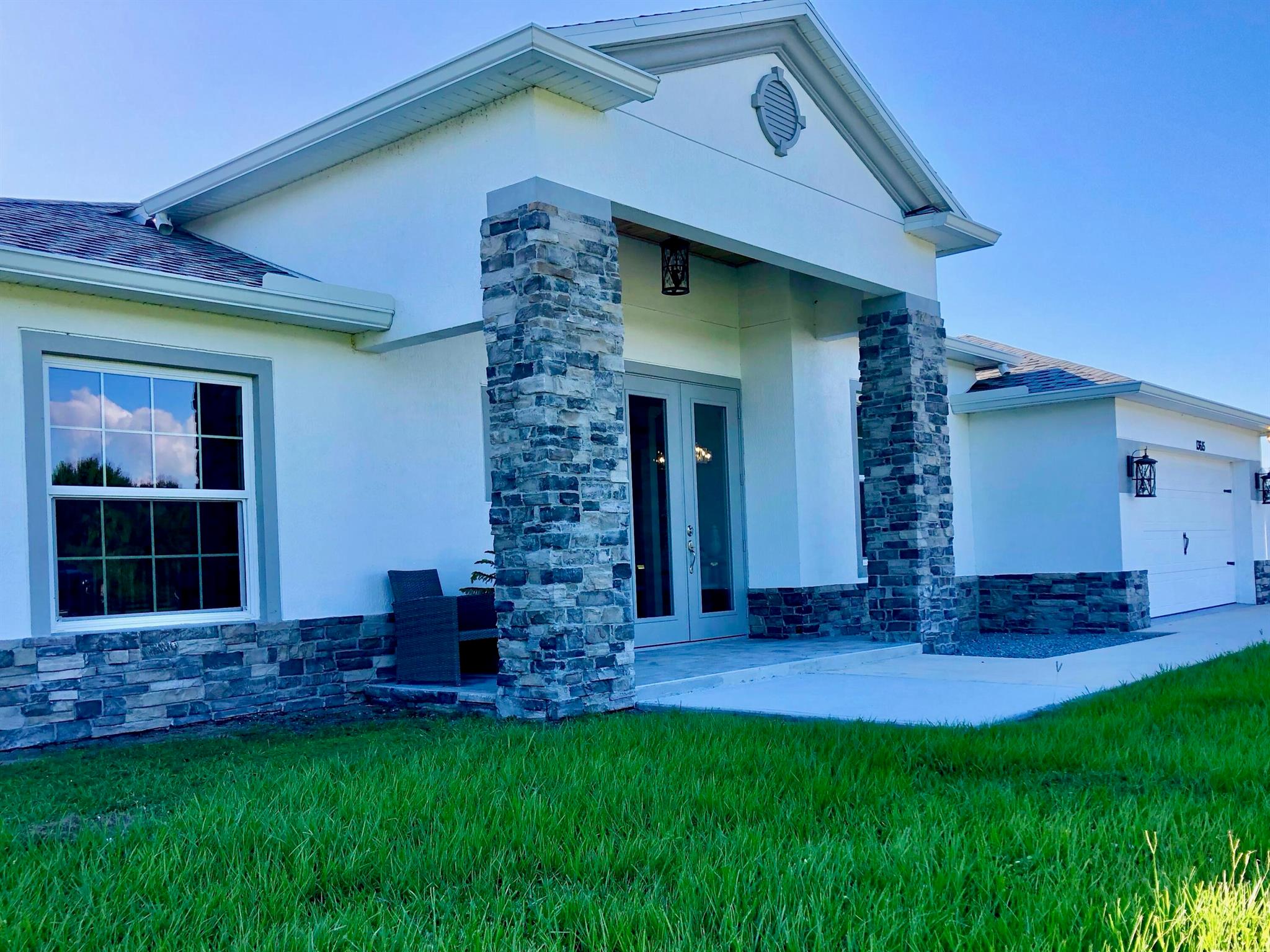 Discover this TURNKEY 2022 CBS built 4 bed/3 bath, 2,500+ sq ft country retreat on 5.41 acres that delivers luxury and rural character all in one. The property features equestrian-ready infrastructure including a 960 sq ft horse barn, dedicated tack room, stall by pond w/water and lush, fenced pastures secured by perimeter 4‑board fencing and a 6‑ft PVC privacy fence around the yard.Inside, enjoy versatile living spaces with vaulted ceilings, well-appointed kitchen, and a layout designed for both family living and entertaining. Imagine morning coffee on the porch as horses graze nearby; alfresco dinners beneath expansive skies and fishing in the stocked pond. Located in the gated equestrian community of Bridlewood Ranches offering pea