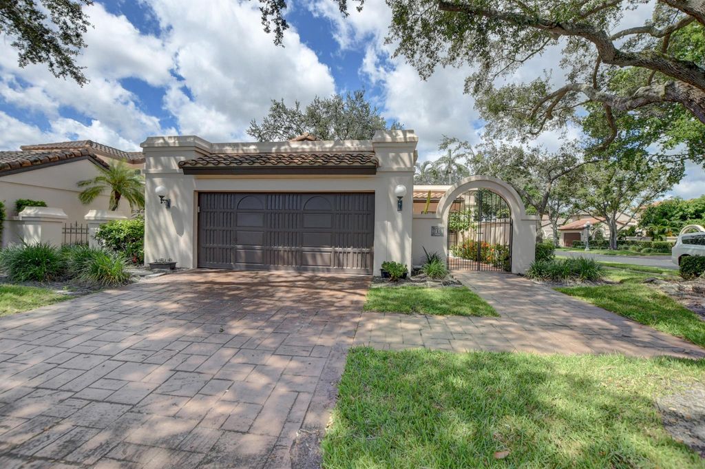 Photo of 761 Deer Creek Via Genov Road, Deerfield Beach, FL 33442 (MLS # R10917164)