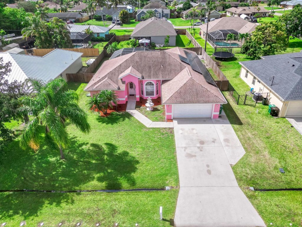Photo of 522 SE Wallace Terrace, Port St Lucie, FL 34983 (MLS # R10894710)