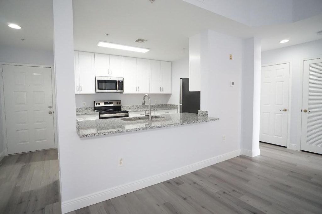 Photo of 1200 Town Center Drive #409, Jupiter, FL 33458 (MLS # R10942323)