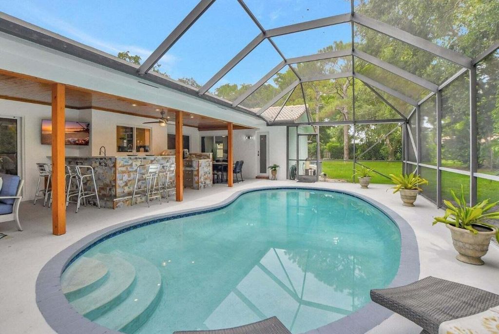 Photo of 2416 NW 32nd Street, Boca Raton, FL 33431 (MLS # R10991999)