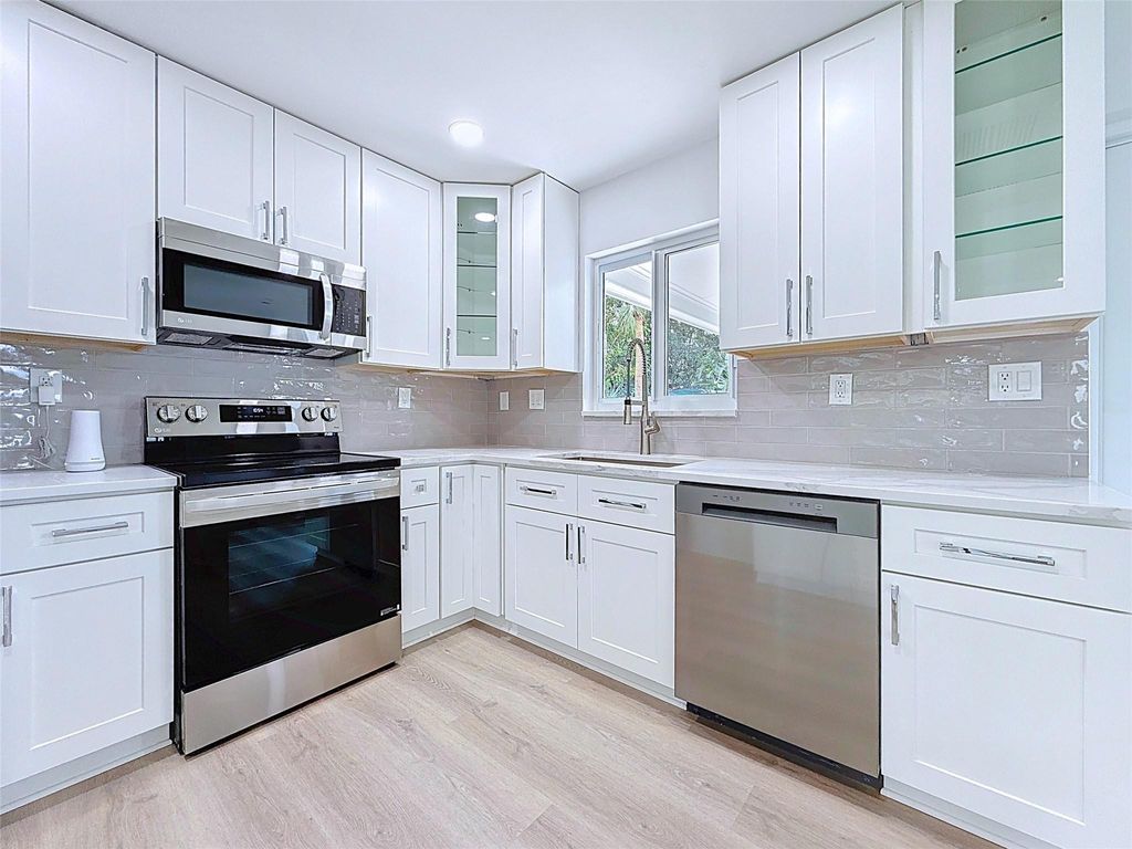 Photo of 12 SW 13th Street, Deerfield Beach, FL 33441 (MLS # F10525281)