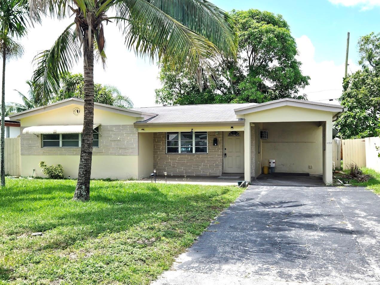 Look no further, Amazing 3/2 home in Miramar with Carport. This home has been freshly painted and is move-in ready. Brand New Central AC with all new Duct Work too. Home features nice open space for living area, large yard with delicious mango tree. On the exterior there is a shed for extra storage and a huge laundry room for more storage too. 3rd bedroom has a barn door, so it can be used as office or third bedroom and it does have a closet. Carport can be converted to 4th bedroom if needed. Roof is 2002