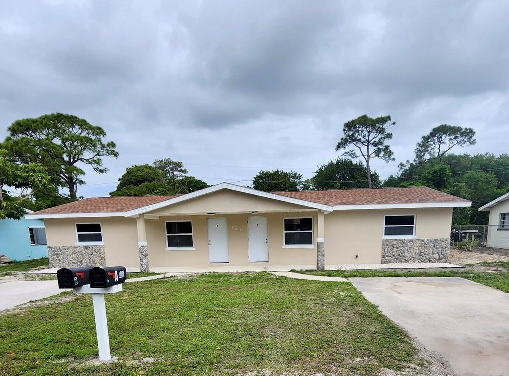 Photo of 806 N Lake Drive, Fort Pierce, FL 34982 (MLS # R10993562)