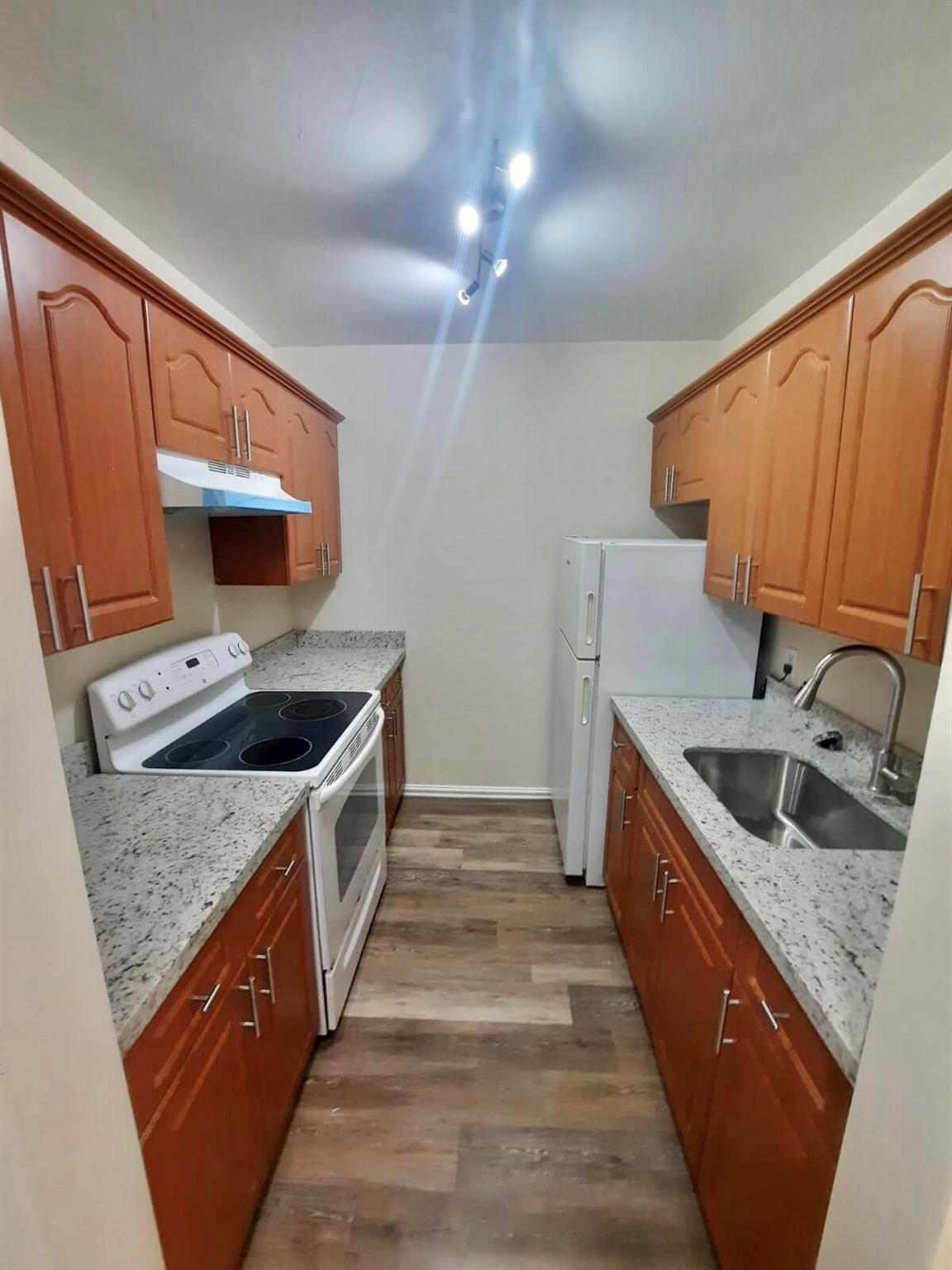 First floor condo with one assigned parking space right outside your front door. One bedroom one Bath-Updated unit with wooden floors throughout, remodeled kitchen with granite countertop and remodeled bathroom. Lots of closet space. Building features a community pool as well as a laundry facility. Ample guest parking. No pets allowed by Hoa. Community Laundry- Water is included in the rent ! 600+ CS at least one tenant.