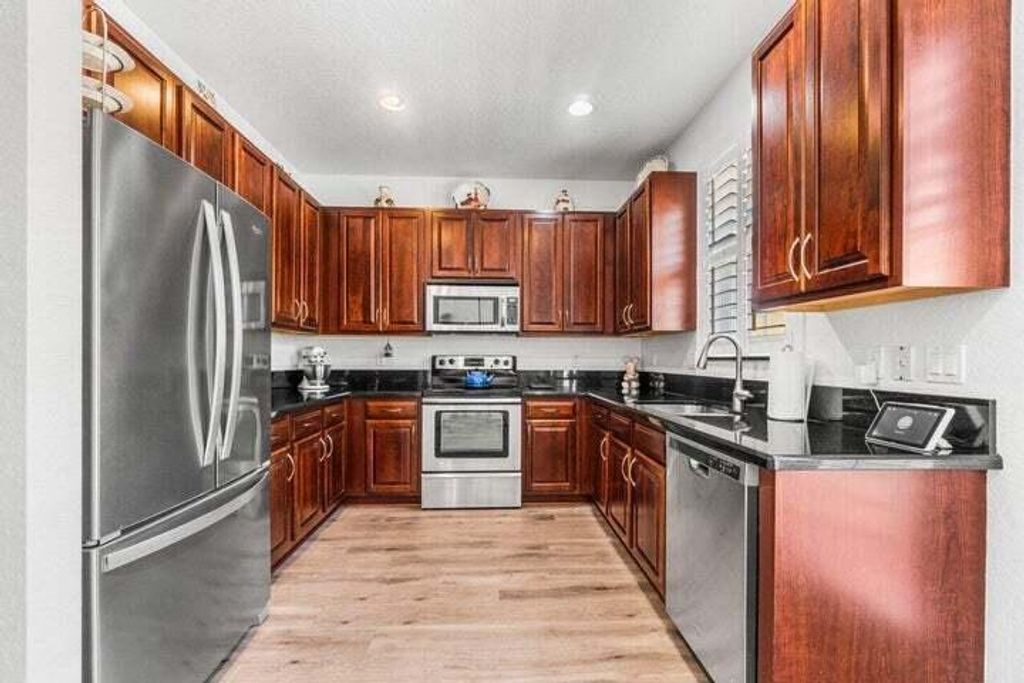 Photo of 207 Edenberry Avenue, Jupiter, FL 33458 (MLS # B26011679)
