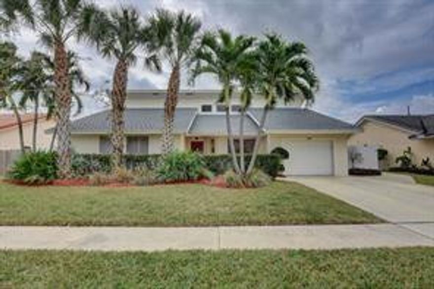 Don’t miss this exceptional 3BR/2.5BA Pool home in highly sought-after Hidden Valley! Bursting with character, it features arched doorways, cedarwood vaulted ceilings, skylights, and a striking stone wood-burning fireplace. The spacious kitchen offers stainless steel appliances and an oversized pantry.  You will appreciate the super spacious spa-inspired primary suite with marble shower with hurricane rated skylights allowing natural light to flow! Plantation shutters, crown molding. Enjoy youre private tropical retreat with lush landscaping, oversized screened patio with hurricane shutter, heated pool, Jacuzzi hot tub, and outdoor shower!  No HOA! Zoned for A+ schools. Walk to tennis courts and Hidden Lake Park. Just 1.25 miles to the beach, we cannot wait to show you this great home!