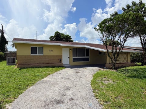 Photo of 2530 NW 26th Court, Oakland Park, FL 33311 (MLS # B26077734)
