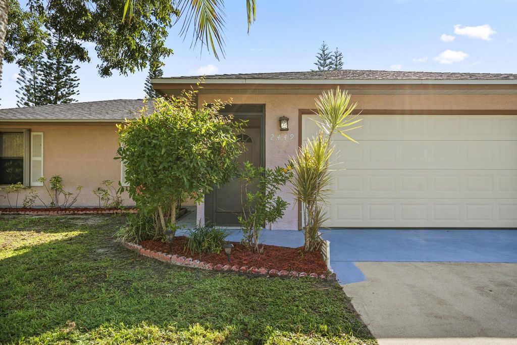 Photo of 2449 SE Marseille Street, Port Saint Lucie, FL 34952 (MLS # R11127976)