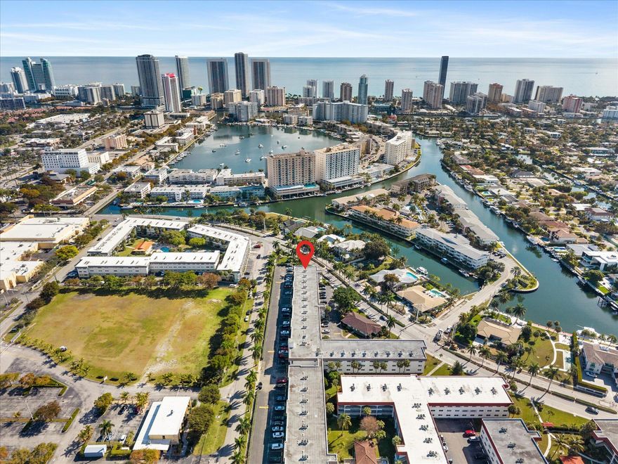 GORGEOUS CORNER END-UNIT CONDO | RENOWNED PARADISE VILLAS | NEWER ROOF | Bright Open Layout | Marble Floors | Remodeled Kitchen with Breakfast Bar | Granite Counters, White Wood Cabinetry, Newer S/S Appliances and Pantry | Primary Bedroom with Walk-In Closet | Ensuite Bath with Frameless Shower | Screened-In Porch and Storage Room | Resort-Like Amenities Offer Renovated Clubhouse, Heated Pool and Lakefront Park with Shuffleboard, Pickleball Courts, BBQ Area and Private Dock | New Elevators | 50 Year Certifications Completed | Prime Hallandale Beach Location, Minutes to Beaches, Gulfstream Casino and Racetrack, Aventura Mall, Fort Lauderdale Airport | Can Rent Immediately | PRESENT ALL OFFERS!