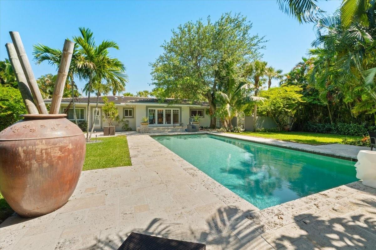 LOWEST PRICE IN HARBOR BEACH! Step through the gates and into a world of classic beauty and coastal charm.
Nestled on the coveted west side of Mayan Drive in Fort Lauderdale’s prestigious Harbor Beach community, this sundrenched 3-bedroom, 2-bath Bermuda-style residence has been thoughtfully updated for modern living while
preserving its elegant soul Set on an oversized, lushly landscaped lot with mature trees and tropical privacy, the
expansive backyard and pool oasis evoke the serene feel of a truly Florida. This home belongs to a voluntary HOA,
giving owners the exclusive option to join Harbor Beach’s private beach pavilion and deep-water marina—ideal for
boating enthusiasts and beach lovers alike.