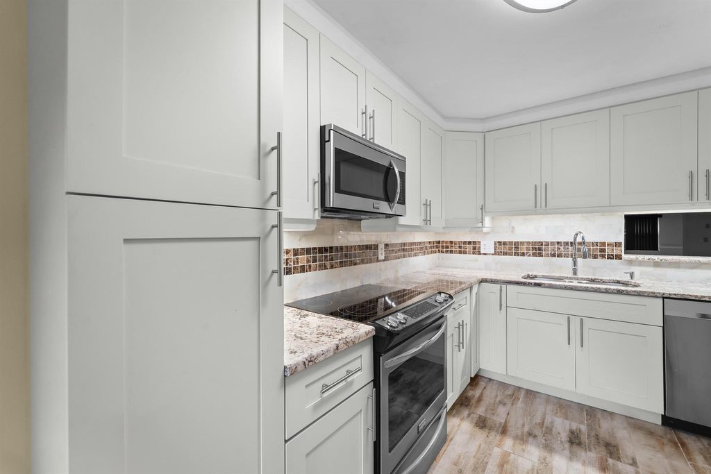 Photo of 10107 Mangrove Drive #105, Boynton Beach, FL 33437 (MLS # R11074114)