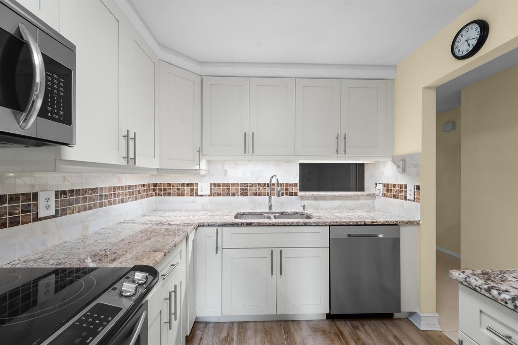 Photo of 10107 Mangrove Drive #105, Boynton Beach, FL 33437 (MLS # R11074114)