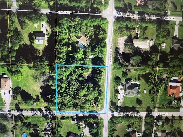 AMAZING HIGH AND DRY CORNER LOT ON PAVED ROAD! 1.36 ACRES, AMAZING COMMUNITY TO BUILD YOUR DREAM HOME! ONLY MINUTES AWAY FROM WESTLAKE, SHOPPING, BANKS, SCHOOLS, ETC.
