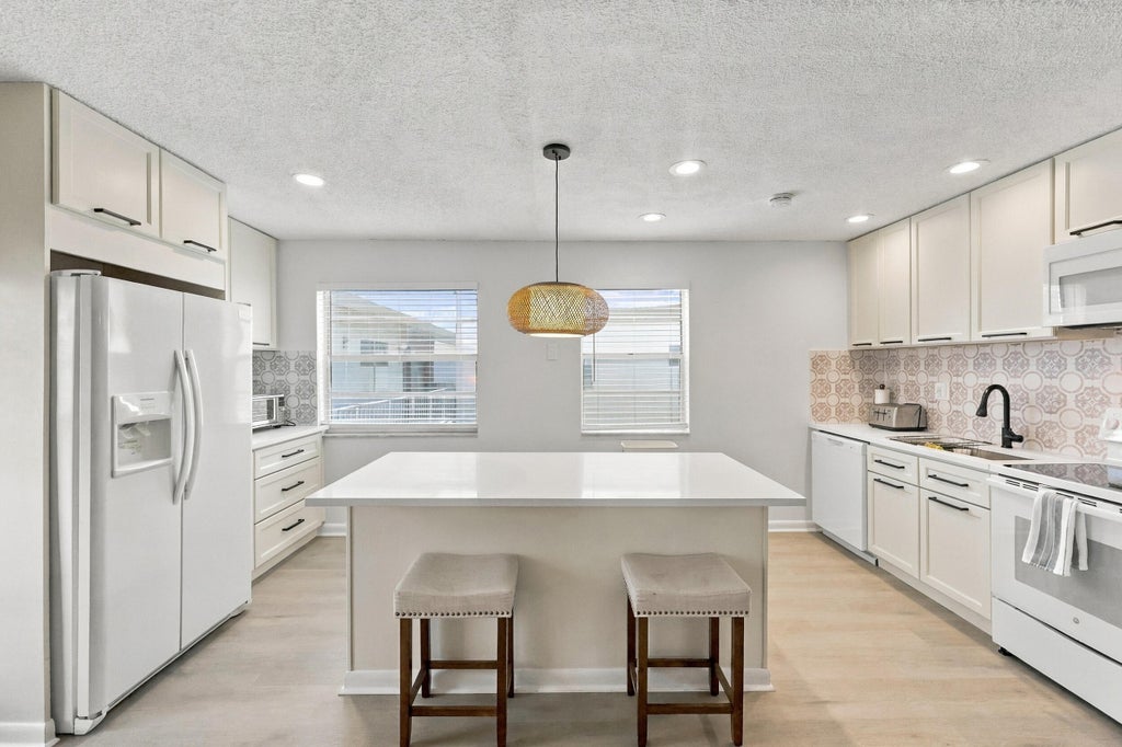 Photo of 74 NORMANDY B, Delray Beach, FL 33484 (MLS # B26087721)