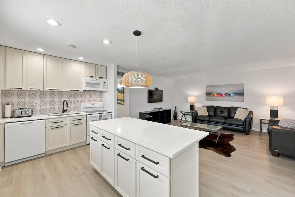 Photo of 74 NORMANDY B, Delray Beach, FL 33484 (MLS # B26087721)