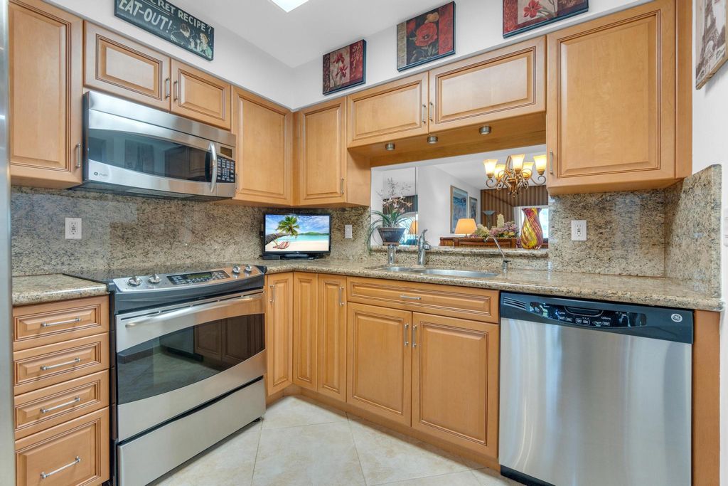 Photo of 7351 Kinghurst Drive #108, Delray Beach, FL 33446 (MLS # B26017605)
