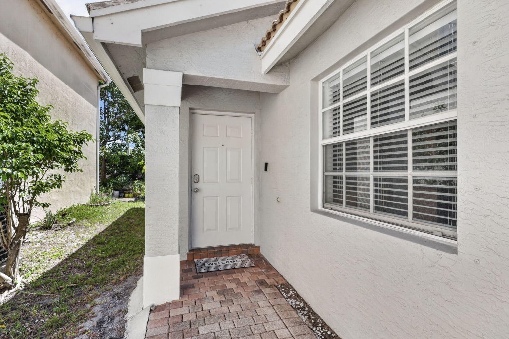 Photo of 5088 Northern Lights Drive, Greenacres, FL 33463 (MLS # B26082365)
